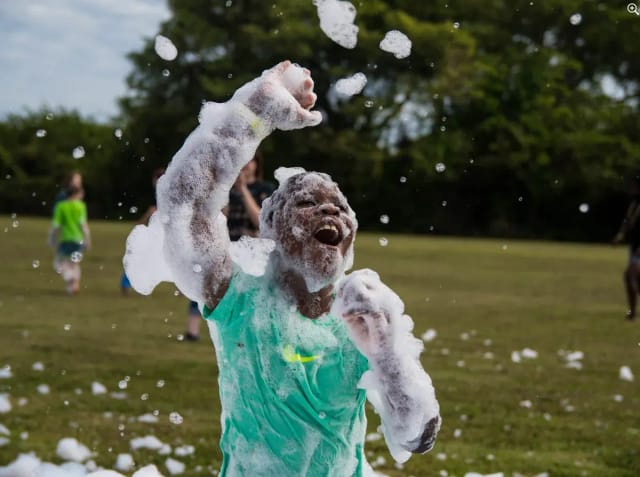 Foam cannon action at a kids party